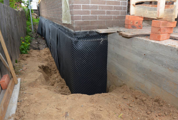 Happy homeowners after waterproofing job in West Union